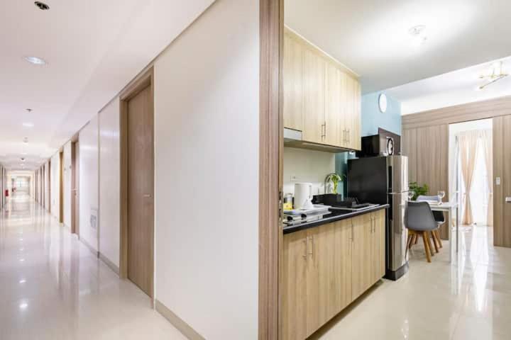 Shore 2 Residences 1Br Deluxe Room In Moa Complex Manila Bagian luar foto